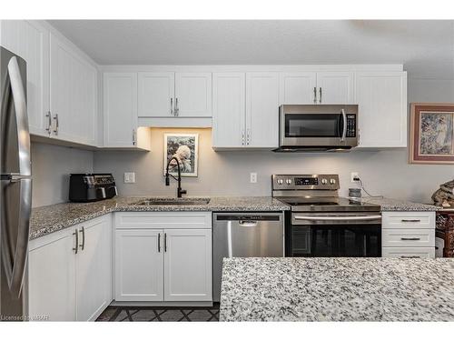 64F-1989 Ottawa Street S, Kitchener, ON - Indoor Photo Showing Kitchen With Stainless Steel Kitchen With Upgraded Kitchen