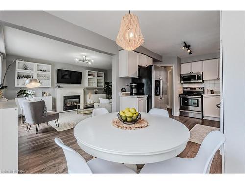 111 Wheatland Drive, Cambridge, ON - Indoor Photo Showing Dining Room With Fireplace