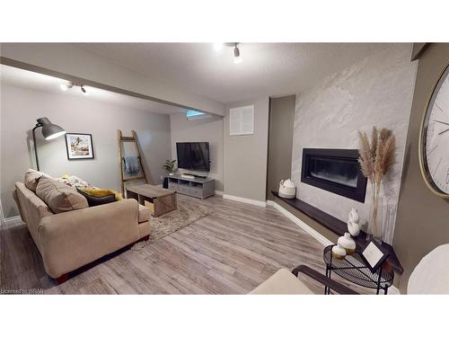 52 Rushbrook Drive, Kitchener, ON - Indoor Photo Showing Living Room With Fireplace