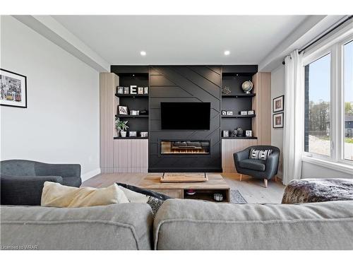 15 Grundy Crescent, Grand Valley, ON - Indoor Photo Showing Living Room With Fireplace