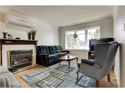 63 Cambridge Avenue, Kitchener, ON - Indoor Photo Showing Living Room With Fireplace