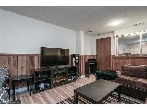 74 Shadeland Crescent, Kitchener, ON - Indoor Photo Showing Living Room With Fireplace