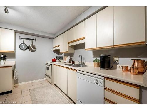 604-55 Green Valley Drive, Kitchener, ON - Indoor Photo Showing Kitchen With Double Sink