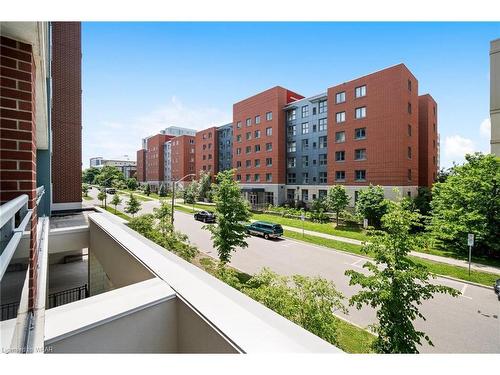 212-308 Lester Street, Waterloo, ON - Outdoor With Balcony With Facade