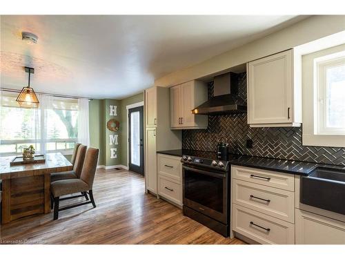 9499 Maas Park Drive, Mount Forest, ON - Indoor Photo Showing Kitchen With Double Sink