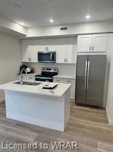 69-405 Myers Road, Cambridge, ON - Indoor Photo Showing Kitchen With Double Sink