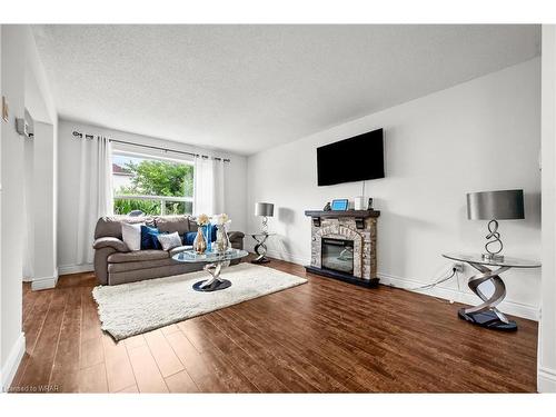 367 Highbrook Crescent, Kitchener, ON - Indoor Photo Showing Living Room With Fireplace