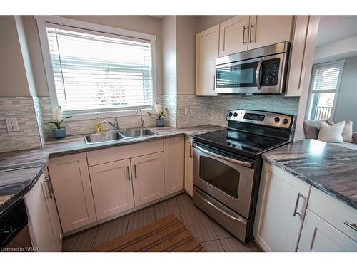 B-489 East Avenue, Kitchener, ON - Indoor Photo Showing Kitchen With Double Sink