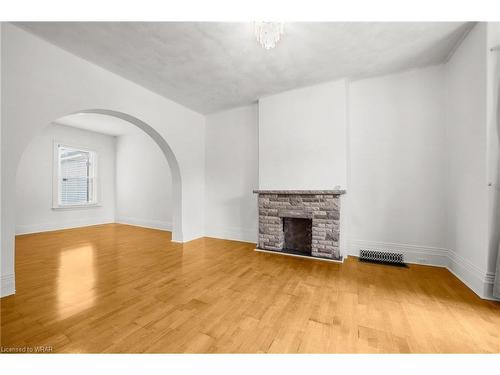 64 East Avenue N, Hamilton, ON - Indoor With Fireplace