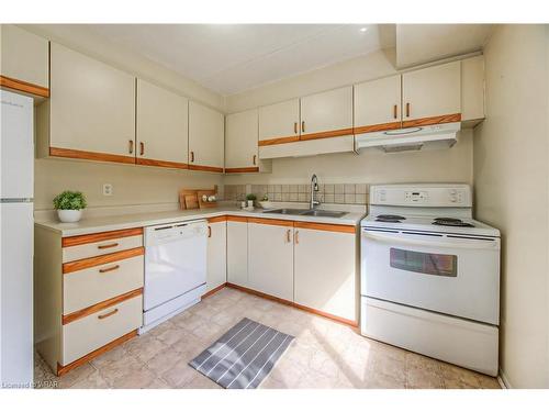 107-163 Ferguson Drive, Woodstock, ON - Indoor Photo Showing Kitchen With Double Sink