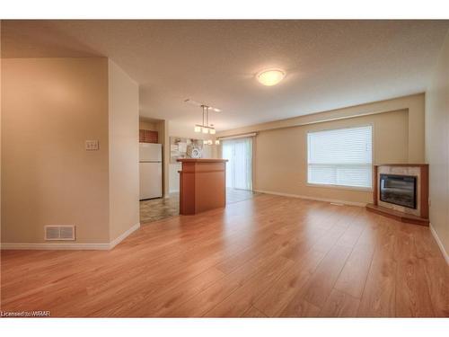 126 Dubrick Crescent, Kitchener, ON - Indoor With Fireplace