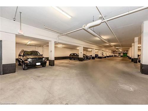 507-85 Duke Street W, Kitchener, ON - Indoor Photo Showing Garage