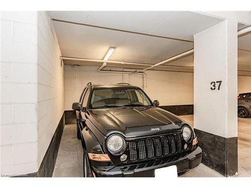 507-85 Duke Street W, Kitchener, ON - Indoor Photo Showing Garage