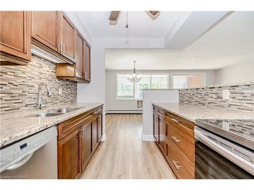 103-400 Champlain Boulevard, Cambridge, ON - Indoor Photo Showing Kitchen With Double Sink With Upgraded Kitchen