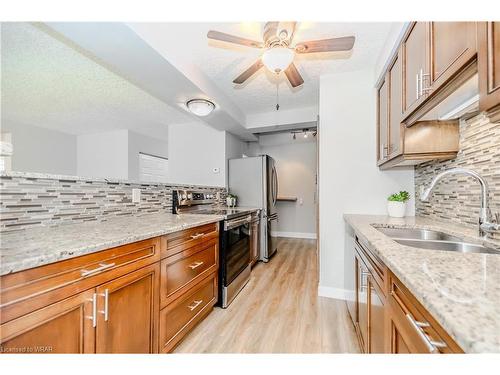 103-400 Champlain Boulevard, Cambridge, ON - Indoor Photo Showing Kitchen With Double Sink With Upgraded Kitchen