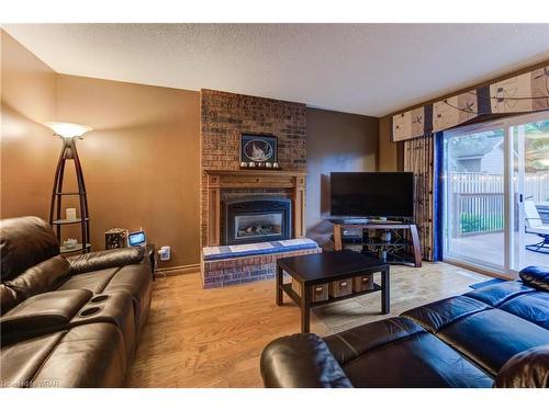 9 Toynbee Crescent, Kitchener, ON - Indoor Photo Showing Living Room With Fireplace