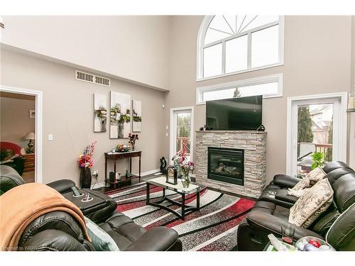 832 Normandy Drive, Woodstock, ON - Indoor Photo Showing Living Room With Fireplace