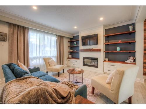 61A Cumberland Street, Brantford, ON - Indoor Photo Showing Living Room With Fireplace