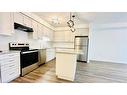 A009-142 Foamflower Place, Waterloo, ON  - Indoor Photo Showing Kitchen With Upgraded Kitchen 