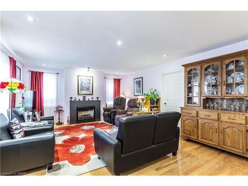 30 Jones Crescent, Tillsonburg, ON - Indoor Photo Showing Living Room With Fireplace