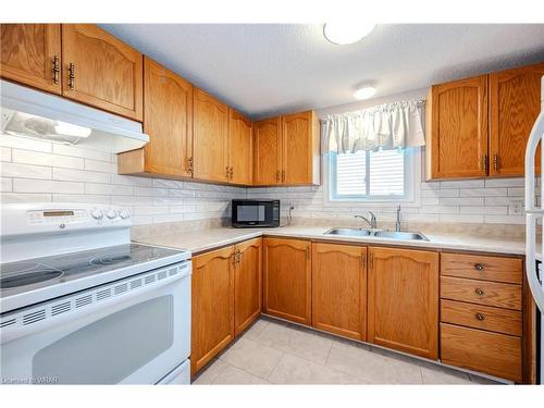 140 Broken Oak Crescent, Kitchener, ON - Indoor Photo Showing Kitchen With Double Sink