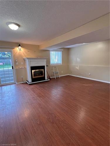 Lower-A-227 Inverhuron Crescent, Waterloo, ON - Indoor Photo Showing Other Room With Fireplace