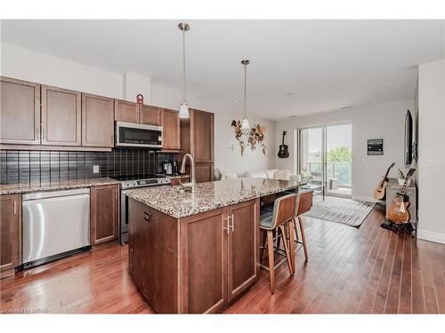 504-223 Erb Street W, Waterloo, ON - Indoor Photo Showing Kitchen With Stainless Steel Kitchen With Double Sink With Upgraded Kitchen