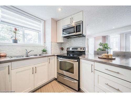 A-489 East Avenue, Kitchener, ON - Indoor Photo Showing Kitchen With Double Sink