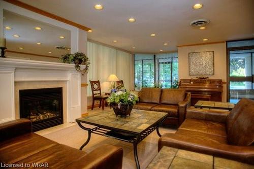 505-6 Willow Street, Waterloo, ON - Indoor Photo Showing Living Room With Fireplace