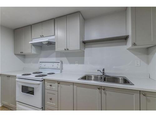 B-99 Nickolas Crescent, Cambridge, ON - Indoor Photo Showing Kitchen With Double Sink