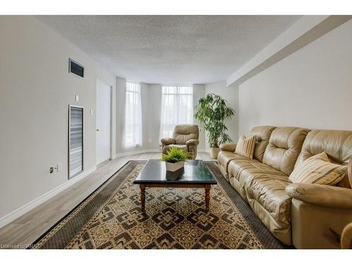 202-1414 King Street E, Kitchener, ON - Indoor Photo Showing Living Room