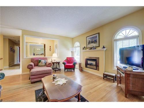 551 Hallmark Drive, Waterloo, ON - Indoor Photo Showing Living Room With Fireplace