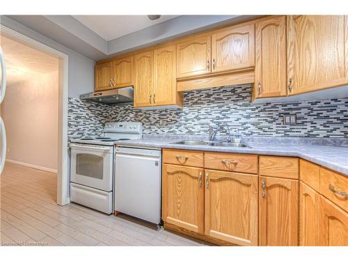 D-144 Wood Street, Brantford, ON - Indoor Photo Showing Kitchen With Double Sink