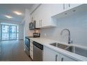 504-155 Caroline Street S, Waterloo, ON  - Indoor Photo Showing Kitchen With Double Sink 