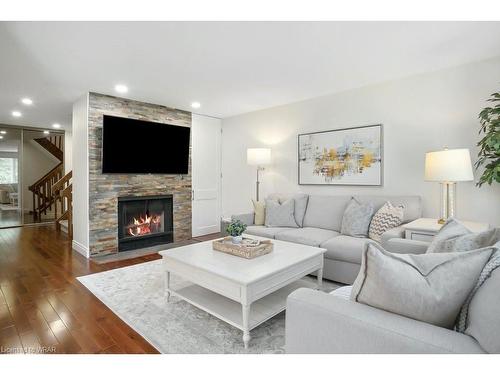 3-313 George Street N, Cambridge, ON - Indoor Photo Showing Living Room With Fireplace