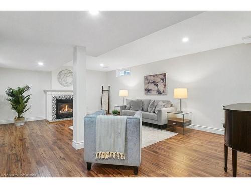 3-313 George Street N, Cambridge, ON - Indoor Photo Showing Living Room With Fireplace