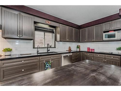 565 Sundew Drive, Waterloo, ON - Indoor Photo Showing Kitchen With Double Sink