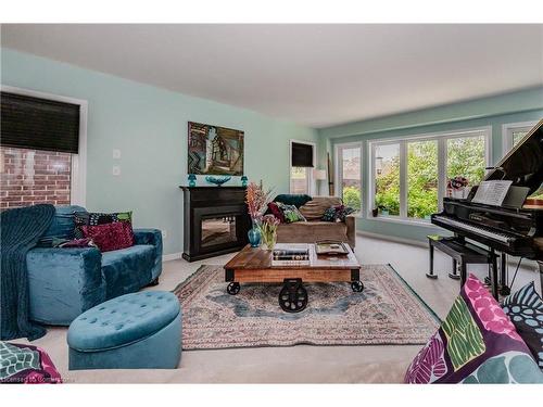 565 Sundew Drive, Waterloo, ON - Indoor Photo Showing Living Room With Fireplace