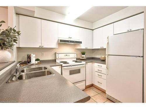 309-2565 Erin Centre Boulevard, Mississauga, ON - Indoor Photo Showing Kitchen With Double Sink