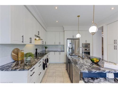 145 Harpin Way E, Fergus, ON - Indoor Photo Showing Kitchen With Stainless Steel Kitchen With Double Sink With Upgraded Kitchen