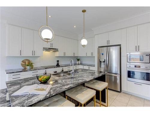 145 Harpin Way E, Fergus, ON - Indoor Photo Showing Kitchen With Stainless Steel Kitchen With Double Sink With Upgraded Kitchen