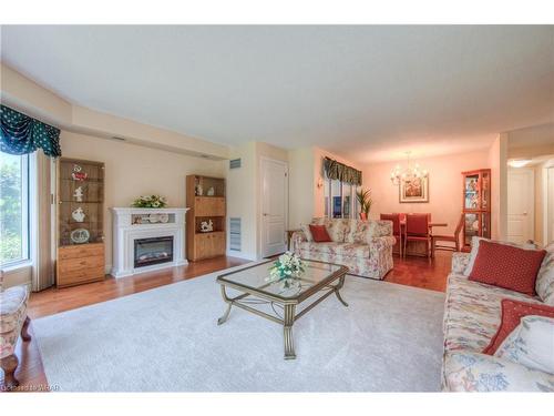 201-190 Hespeler Road, Cambridge, ON - Indoor Photo Showing Living Room With Fireplace