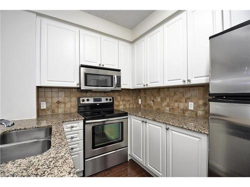 310-170 Water Street N, Cambridge, ON - Indoor Photo Showing Kitchen With Double Sink