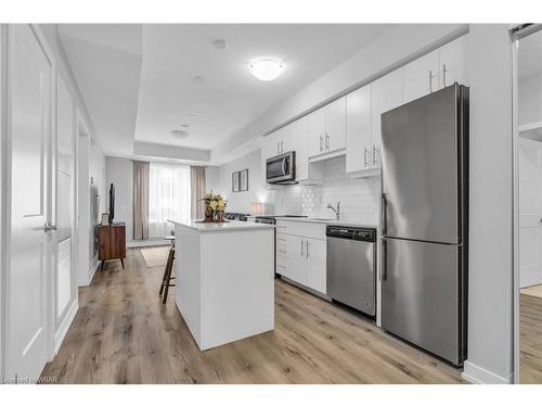 304-243 Northfield Drive E, Waterloo, ON - Indoor Photo Showing Kitchen With Stainless Steel Kitchen With Upgraded Kitchen