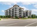 304-243 Northfield Drive E, Waterloo, ON  - Outdoor With Balcony With Facade 