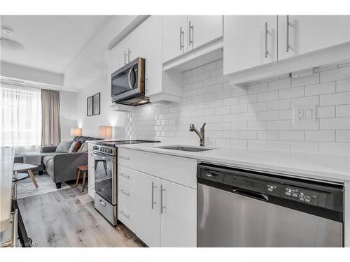 304-243 Northfield Drive E, Waterloo, ON - Indoor Photo Showing Kitchen With Stainless Steel Kitchen With Upgraded Kitchen