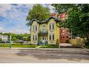 143 Queen Street N, Kitchener, ON  - Outdoor With Balcony With Facade 