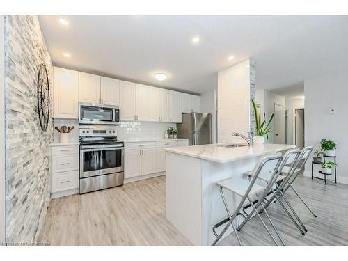 305-276 Eiwo Court, Waterloo, ON - Indoor Photo Showing Kitchen With Upgraded Kitchen