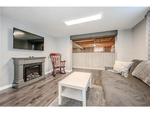 66 Schweitzer Street, Kitchener, ON - Indoor Photo Showing Living Room With Fireplace