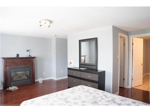 53 Sandwell Court W, Kitchener, ON - Indoor Photo Showing Bedroom With Fireplace